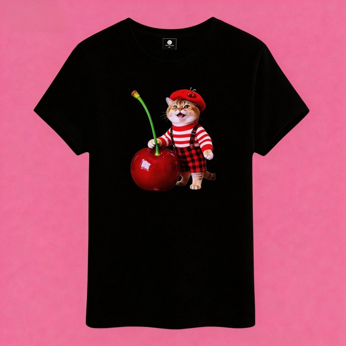 Sunny Brand t-shirt detail, close-up of playful cherry cat graphic with giant red cherry