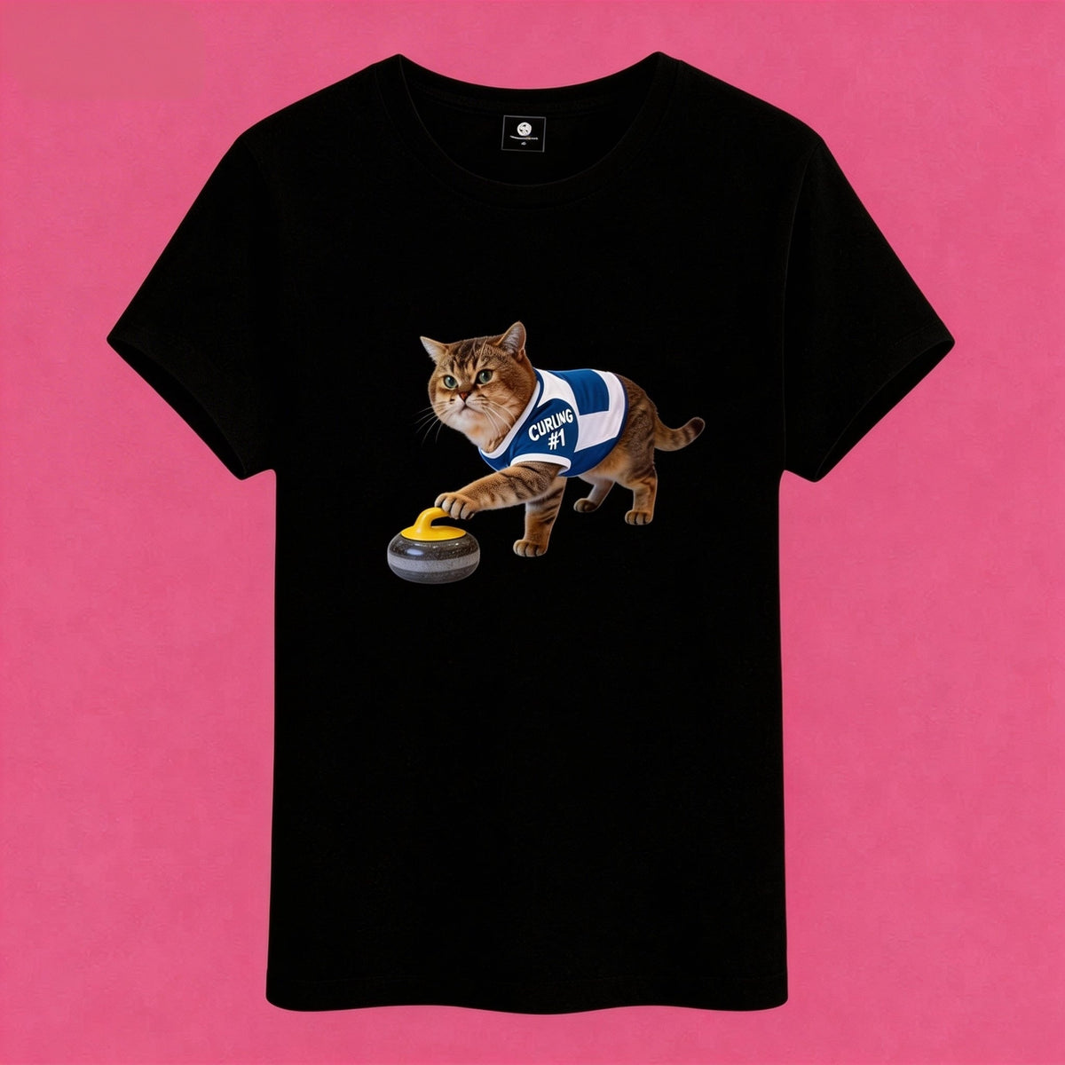 Sunny Brand t-shirt detail, close-up of playful curling cat graphic with stone