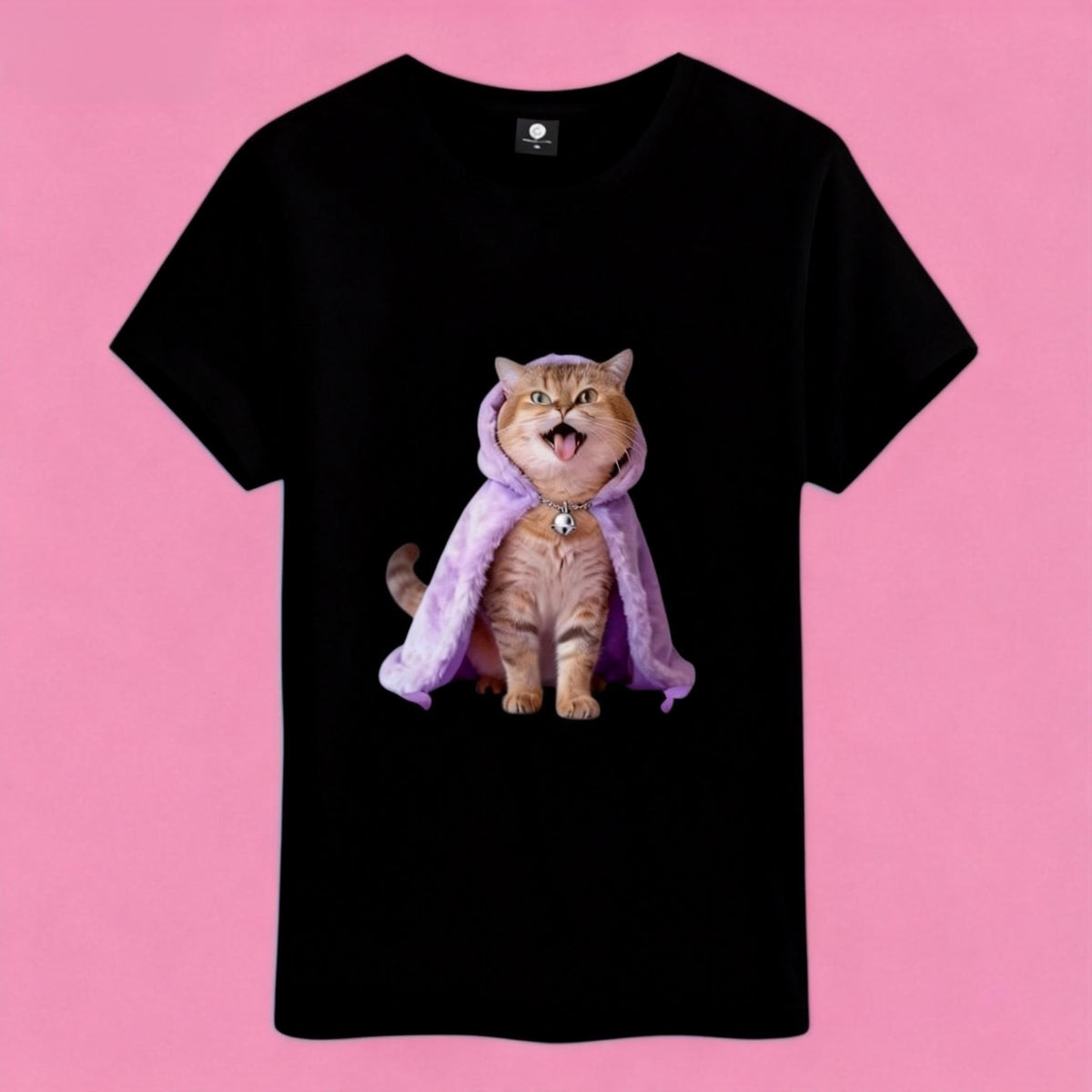 Sunny Brand t-shirt detail, close-up of cheerful cat in purple cloak graphic design