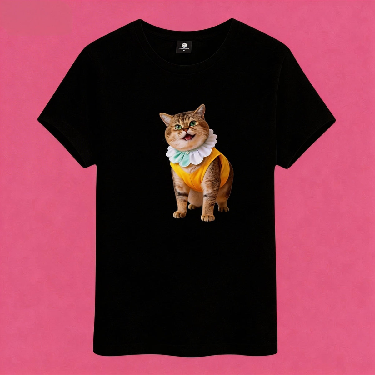 Sunny Brand t-shirt detail, close-up of playful ruffle collar cat graphic with blue bow